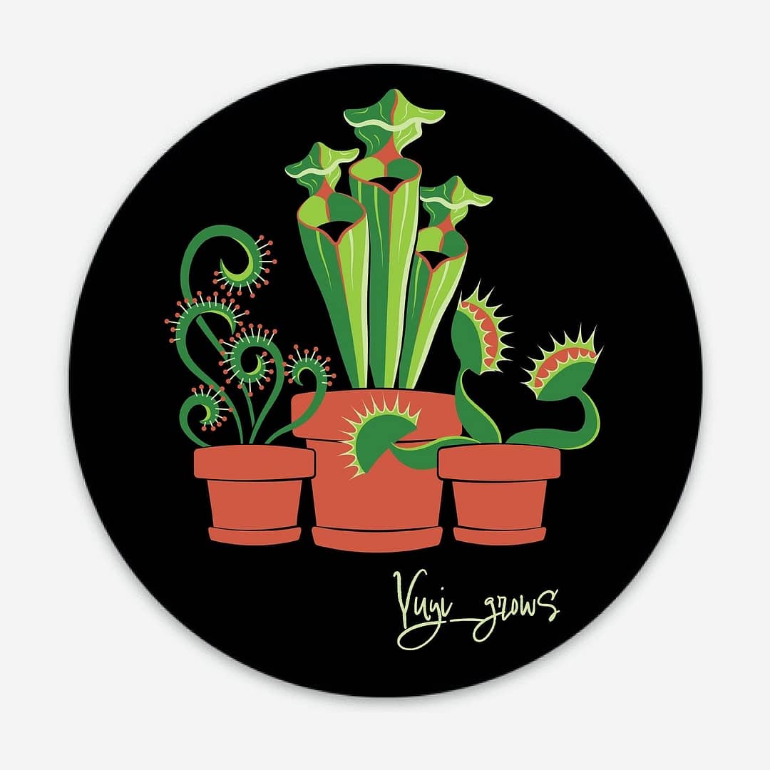 A black, circular sticker of three carnivorous plants