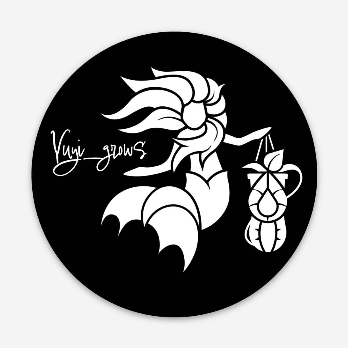 A black, circular sticker with the Yuyi_Grows logo and "Yuyi_Grows" written in script font